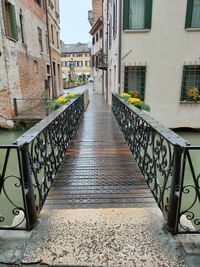 Rear view of woman walking on staircase