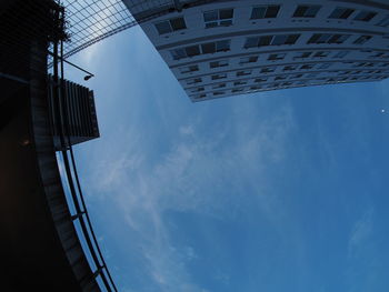 Low angle view of modern buildings against sky