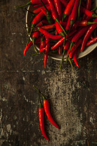 High angle view of red chili peppers on table