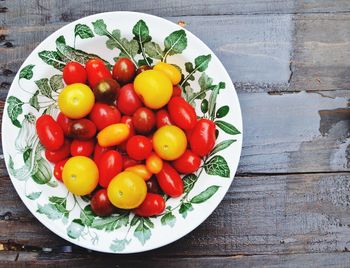 High angle view of fruits in plate on table