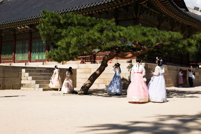 Group of people in front of building