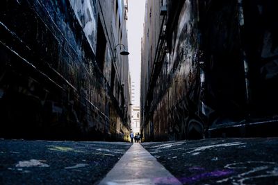 Man amidst buildings in city