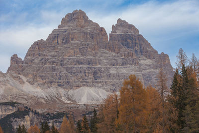 Seasonal autumnal scenery in dolomites with tre cime di lavaredo background