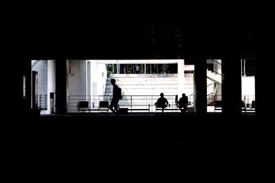 Silhouette of woman in dark background