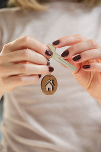 Close-up of woman holding hands