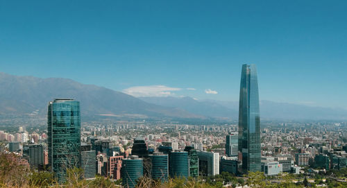 Modern buildings in city against sky