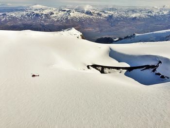 Aerial view of snow covered mountain