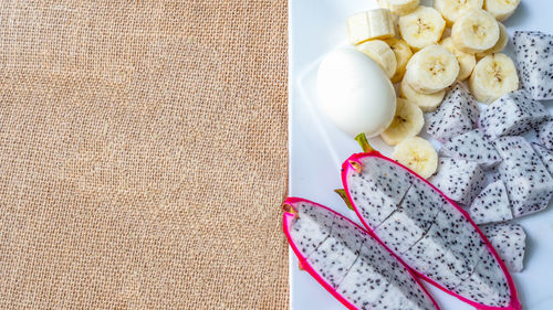 High angle view of fruits in plate on table