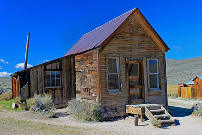 Abandoned house against clear sky