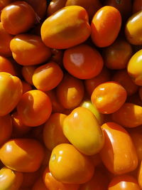 Full frame shot of oranges in market