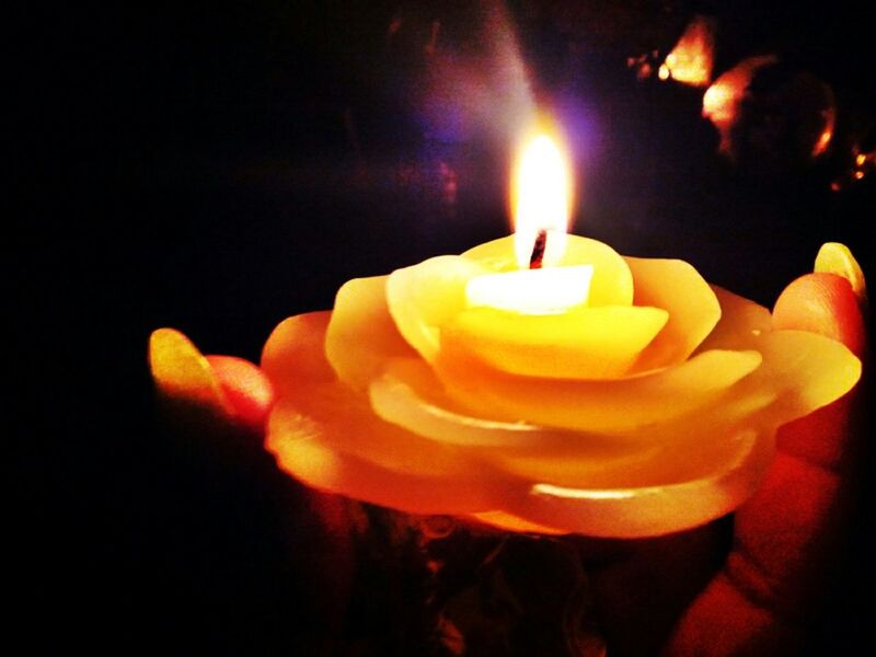 person, burning, flame, indoors, black background, close-up, candle, holding, heat - temperature, studio shot, freshness, glowing, one person, part of, human finger, fire - natural phenomenon, yellow, cropped, unrecognizable person