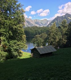 Scenic view of landscape and mountains against sky