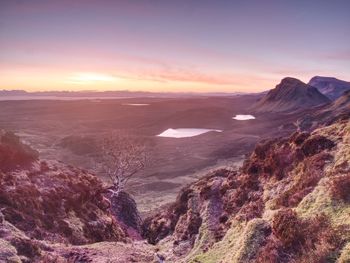 Spring view of quiraing mountains with blue sky, isle of skye. sharp rocky mountains above vallley