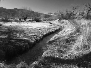 Scenic view of land against sky