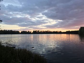 View of lake against sky during sunset