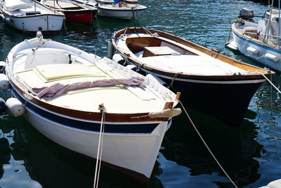 Boats moored at harbor