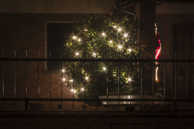 Illuminated street light at night