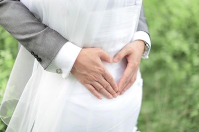 Close-up of newlywed couple