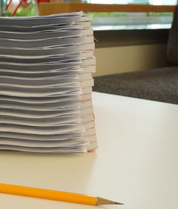 Close-up of stack of books on table