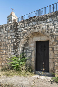 Exterior of historic building against sky