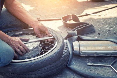 Close-up of man working on car