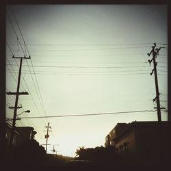 Low angle view of electricity pylon