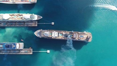 High angle view of boat sailing in sea