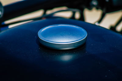 Close-up of blue cup on table