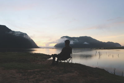 Men camping by the mountains in the morning