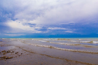 Scenic view of beach against sky