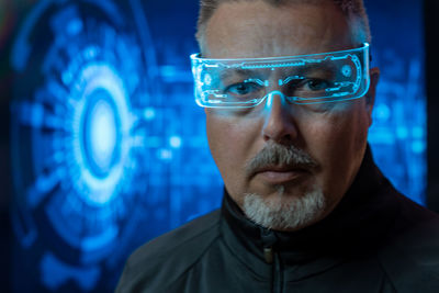 Close-up of man wearing eyeglasses