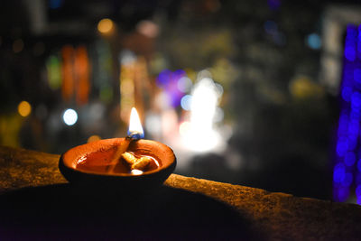 Close-up of illuminated diya during diwali