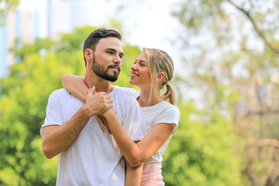 Young couple kissing outdoors