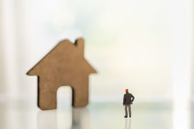 Close-up of toy figurine on wood