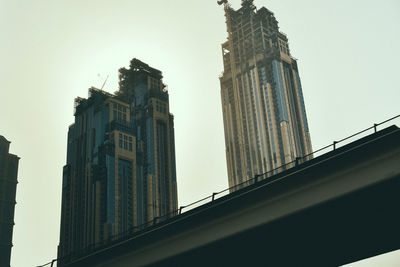 Low angle view of buildings against clear sky