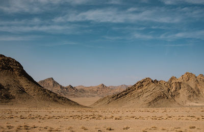 Scenic view of desert against sky