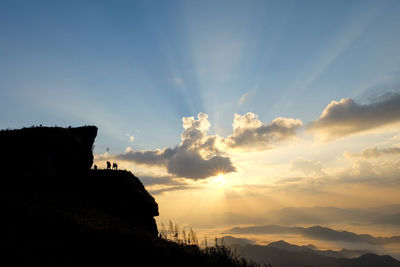 Scenic view of silhouette mountain against sky during sunset