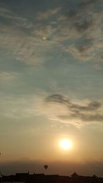 Low angle view of silhouette landscape against sky during sunset