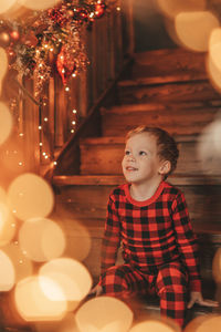 High angle view of boy looking away