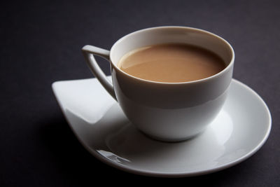 High angle view of coffee cup on table