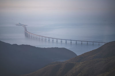 View of bridge over sea against sky