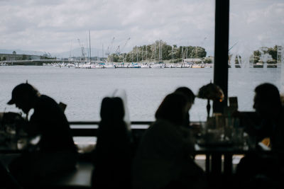 Rear view of people at restaurant