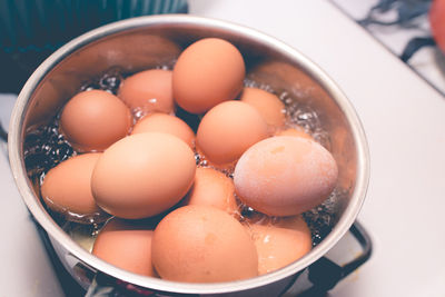 High angle view of eggs boiling