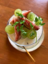 High angle view of fruits in plate on table