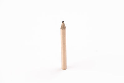 Close-up of pencils against white background