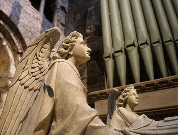 Low angle view of angel statue in temple