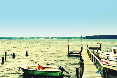 Scenic view of calm sea against clear sky