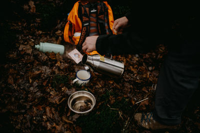 Pouring hot water from a storm kettle