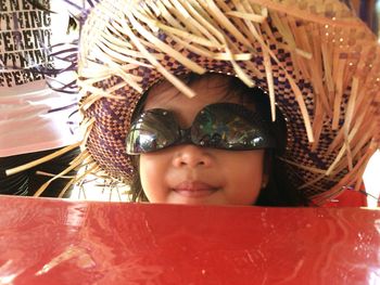 Portrait of cute girl wearing sunglasses