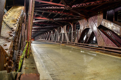 Illuminated bridge at night